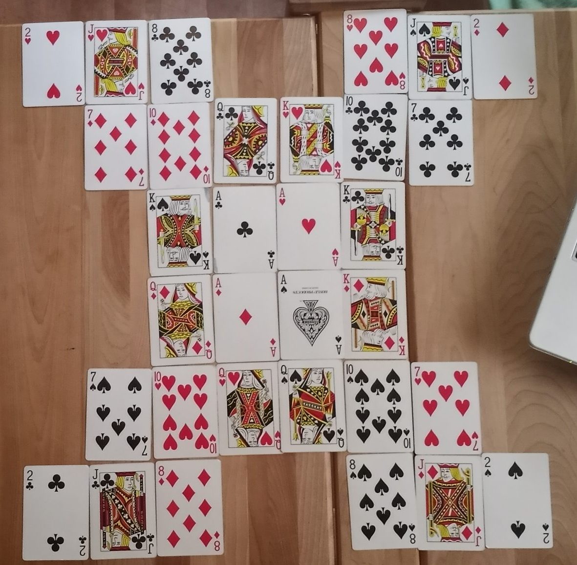 A grid of playing cards laid out in an arrangement called &ldquo;Cartes Noires&rdquo;